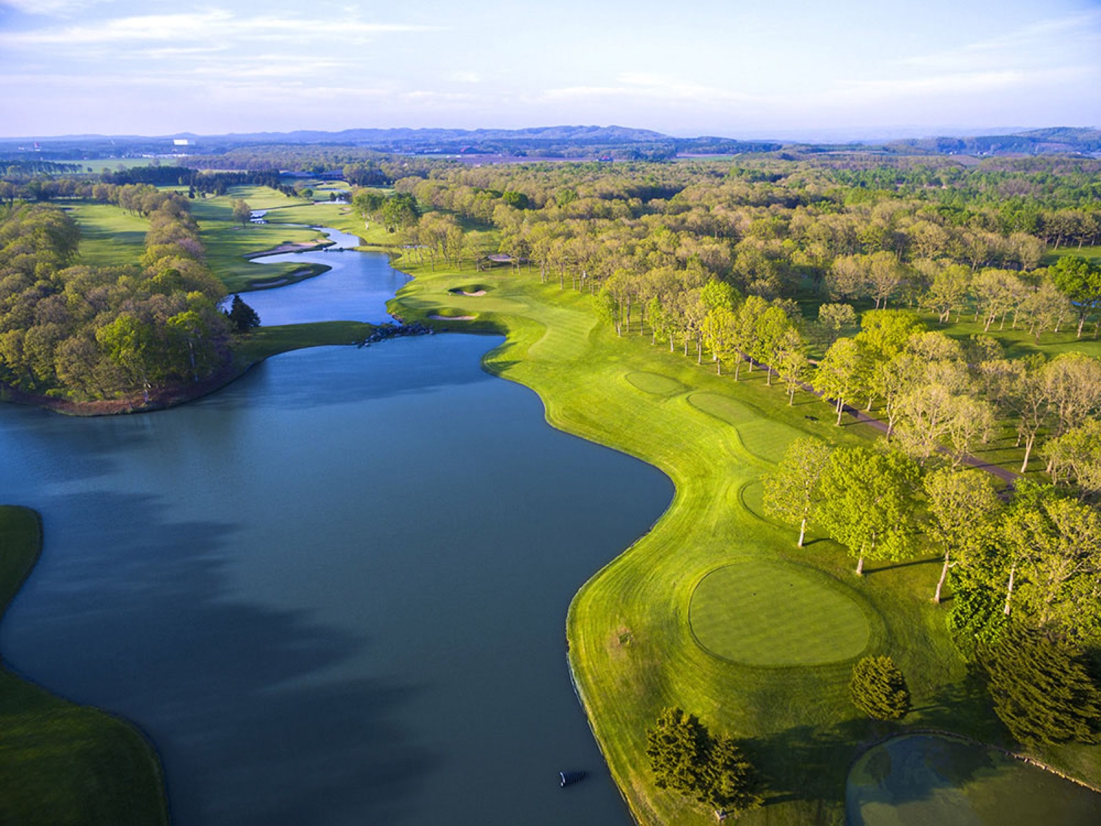 Water hole from above at Hokkaido Classic Golf Club
